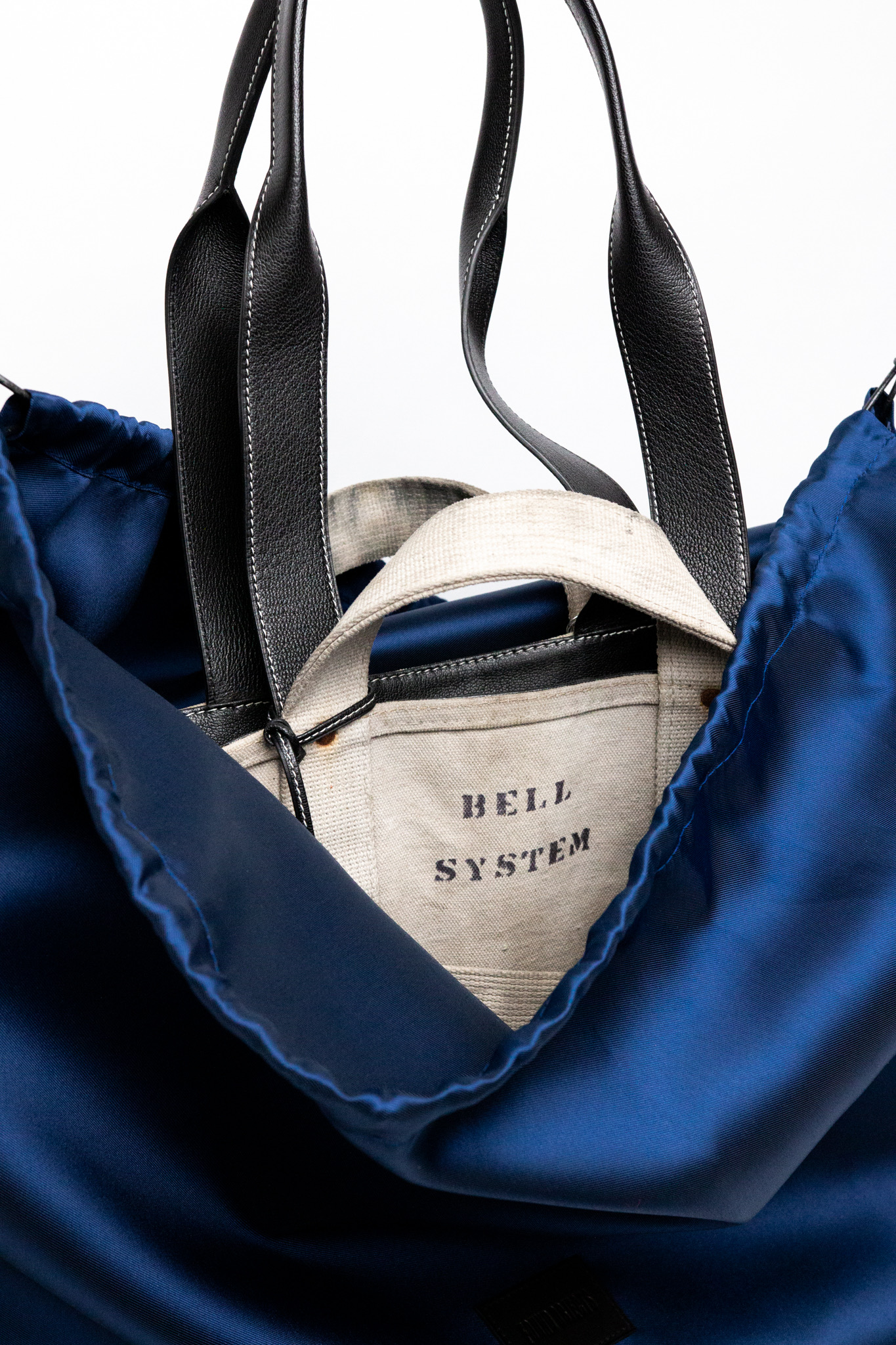 Artisan crafting the bag
